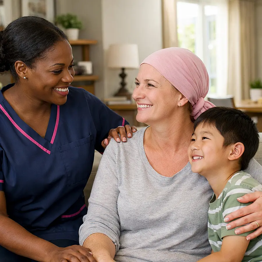 A realistic and uplifting image of a black female caregiver in a 00072b tunic with e51974 detailing smiling with a recovering caucasian woman and her asian son in a comfortable home. The scene shows trust warmth and professional support with realistic dcor and a bright reassuring feel.